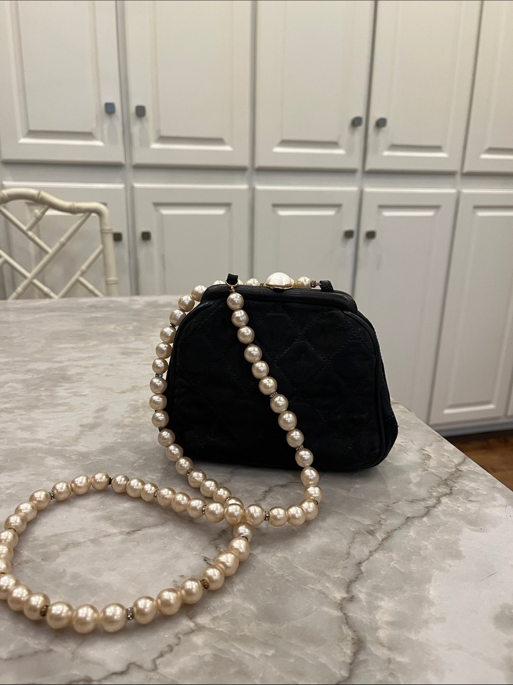Black Satin Authentic Chanel Evening Bag with faux pearl strap.